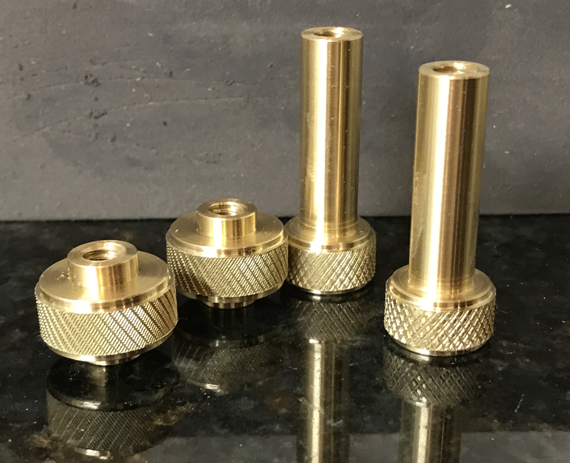 The middle  and top nuts knurled.